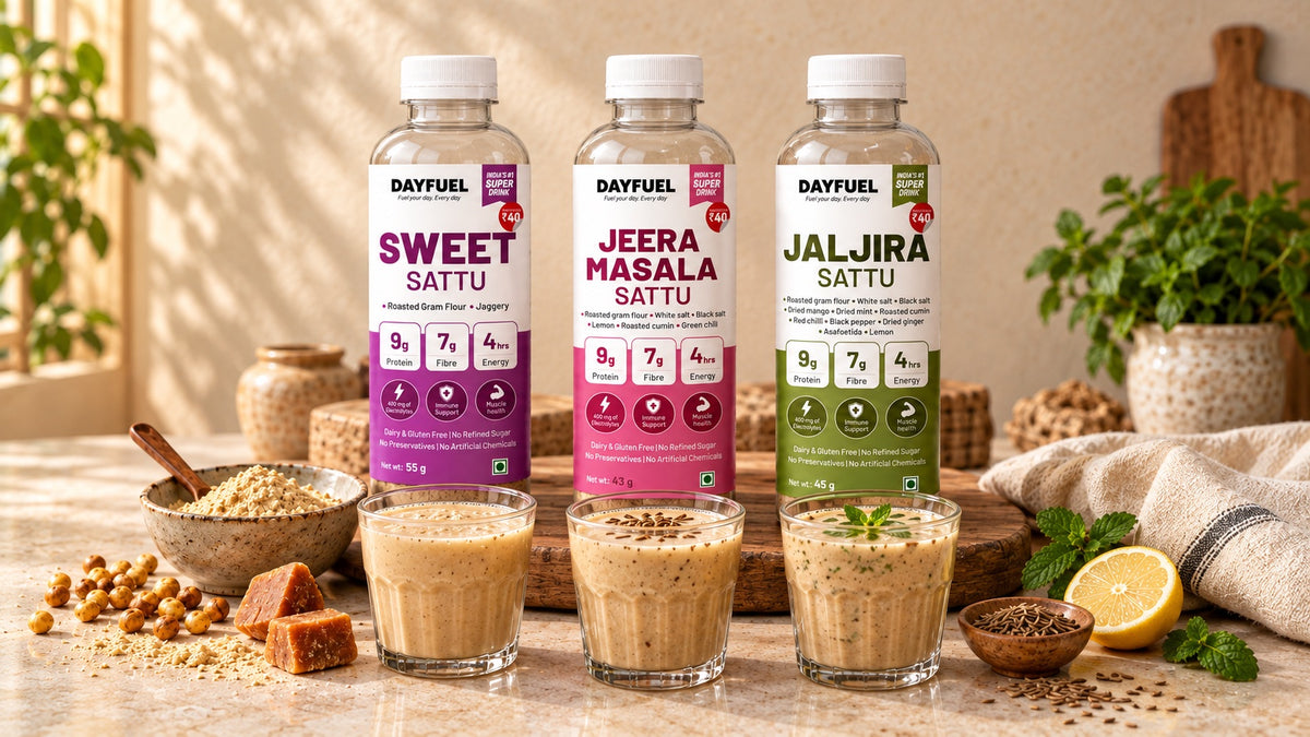 Sweet, Jeera Masala and Jaljira sattu drinks in glasses in front of their Dayfuel bottles, with jaggery, roasted gram and lemon