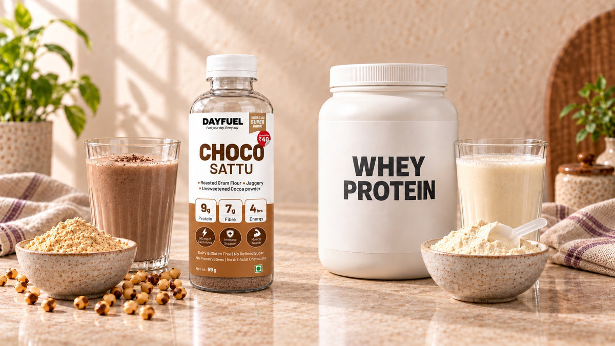 Dayfuel Choco Sattu and a chocolate sattu drink next to a tub of whey protein and a protein shake